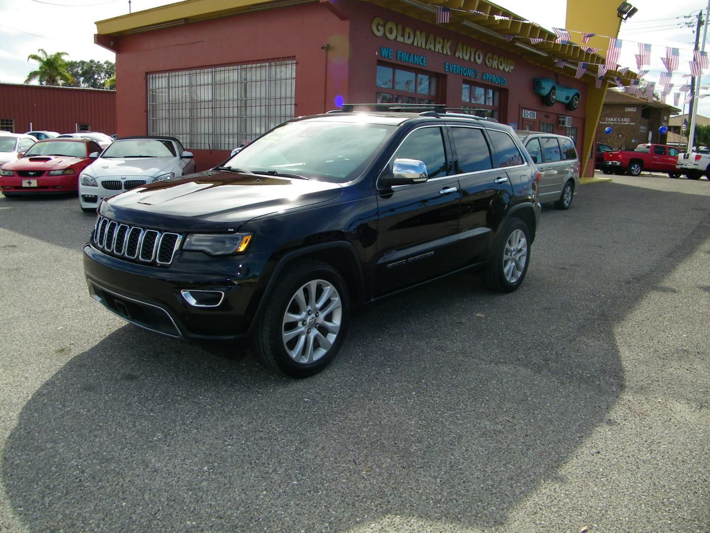 2017 Black /Black Jeep Grand Cherokee Limited (1C4RJEBG4HC) with an 3.6L V6 engine, Automatic transmission, located at 4000 Bee Ridge Road, Sarasota, FL, 34233, (941) 926-0300, 27.298664, -82.489151 - Photo#0